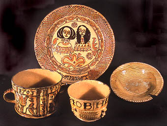 A group of Staffordshire slipwares curated by The Ashmolean Museum, Oxford