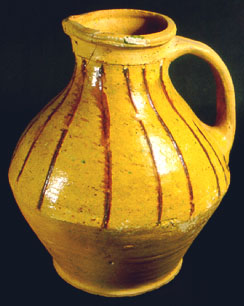 Biconical jug with strap handle
