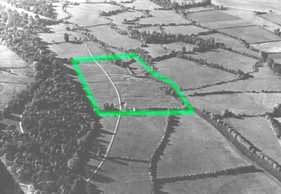 Aerial Photograph of the Seacourt Area taken in 1938 for the Rupert Bruce-Mitford excavations, soil marks can be seen within the green highlighted area denoting structures beneath ground. 